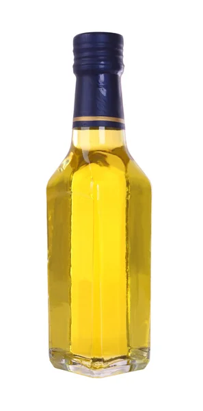 Frasco de licor de vidro amarelo no fundo branco . — Fotografia de Stock