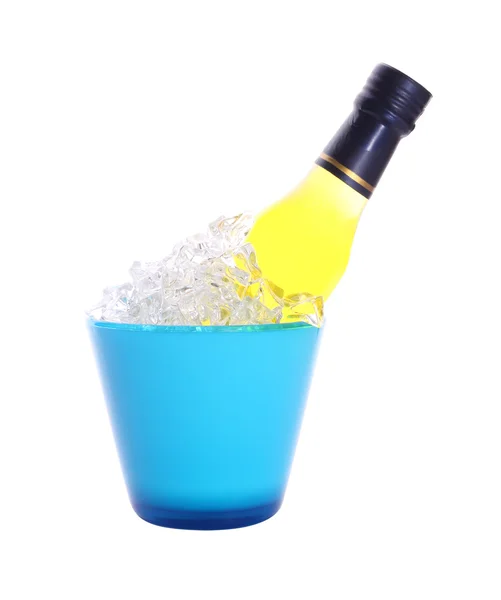 Bottle of liquor in blue ice bucket on white background. — Stock Photo, Image