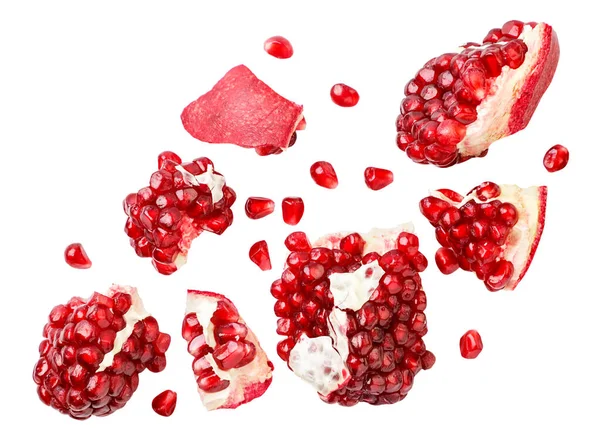 Pomegranate Fruit Pieces Grains Falling Close White Background Cut Isolated — Stockfoto