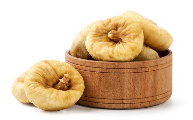 Dried figs in a wooden plate close-up on a white background. Isolated