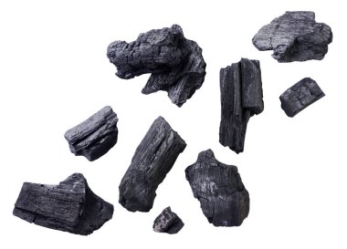 Charcoal flying close-up on a white background. Set