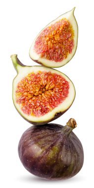 Ripe figs, half and a piece stand on top of each other close-up on a white background. isolated