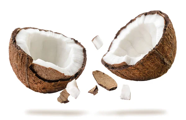 Kokos Podzielony Dwie Połówki Leci Białym Tle Izolacja — Zdjęcie stockowe