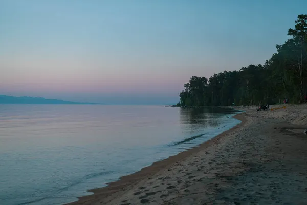 Picturesque view of Lake Baikal in sunrise .Rift lake located in southern Siberia, Russia. The largest freshwater lake by volume in the world. A Natural Wonder Of The World. — Stock Photo, Image