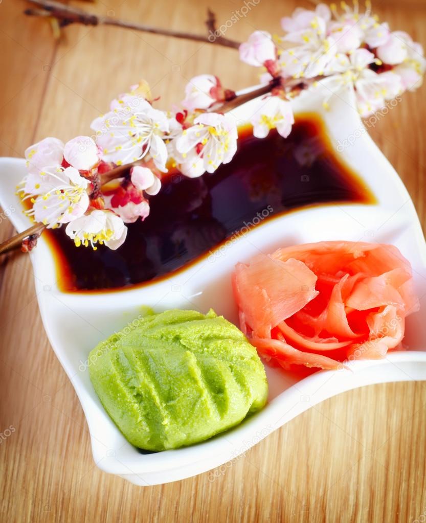 Pickled ginger with soy sauce and wasabi for sushi Stock Photo by