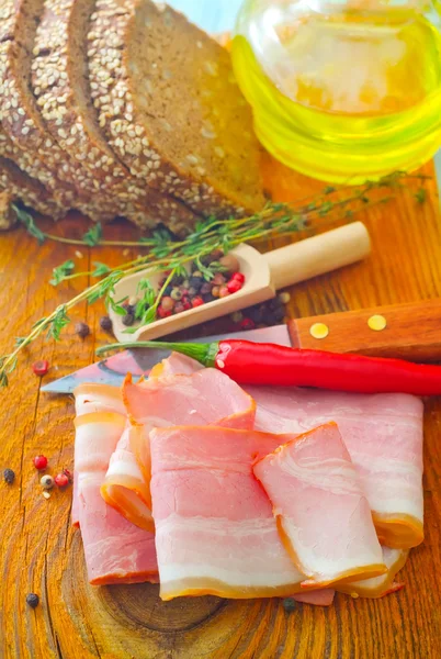 Bacon and bread — Stock Photo, Image