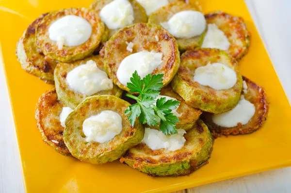 Zucchini fritters on a plate — Stock Photo, Image