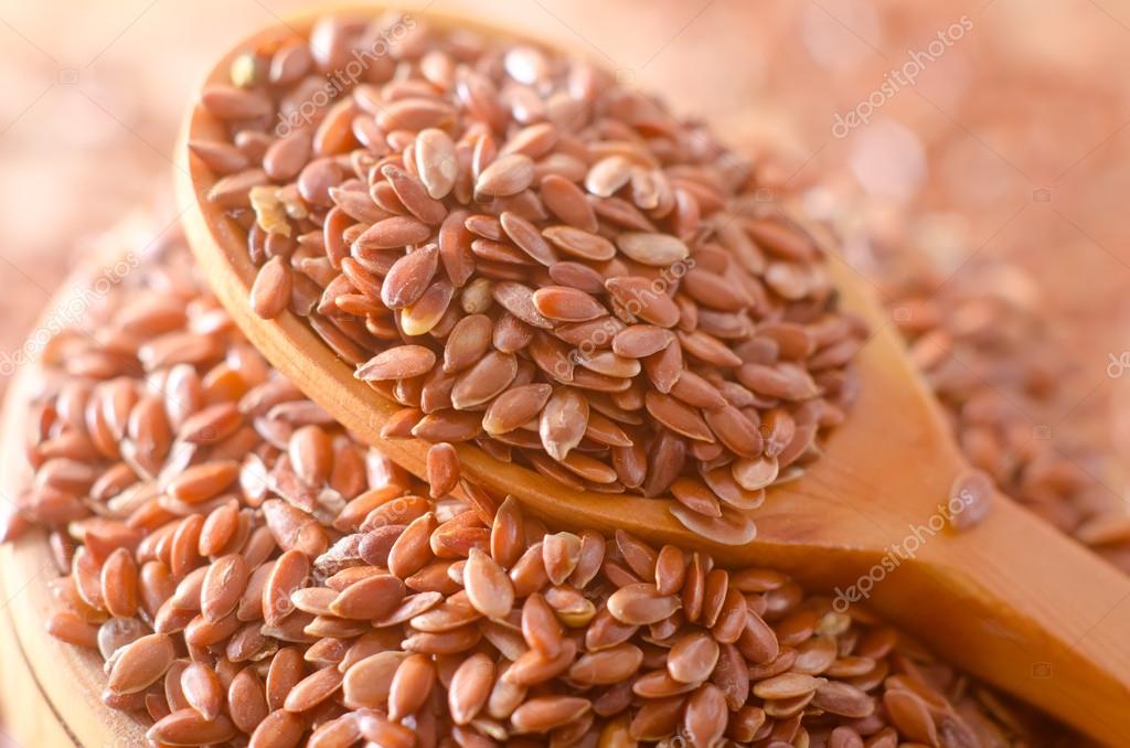 Linseed oil and flax seeds — Stock Photo © tycoon 14301551