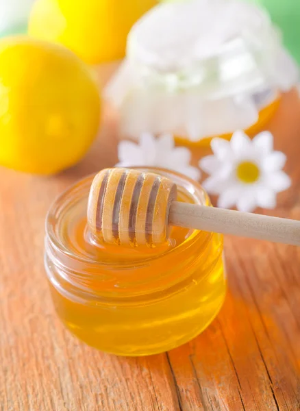 Miel en un frasco — Foto de Stock
