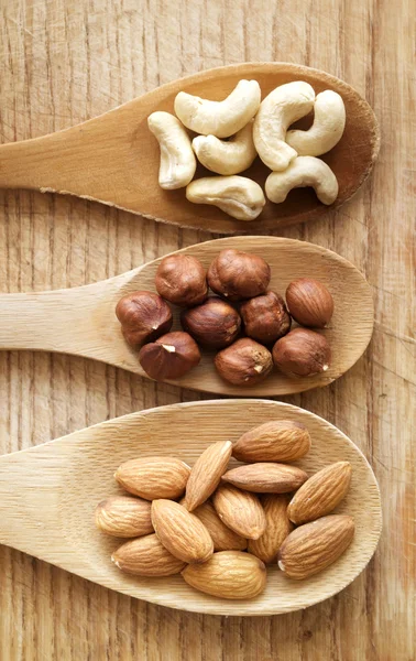 Nuts in spoon — Stock Photo, Image