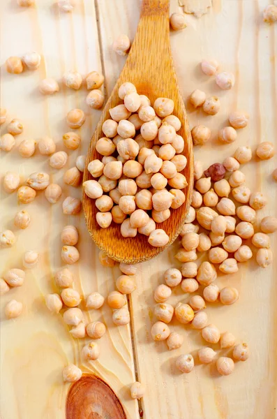 Chickpeas in a spoon — Stock Photo, Image