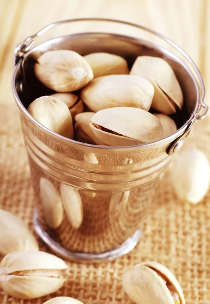 Pistachios in a bucket — Stock Photo, Image