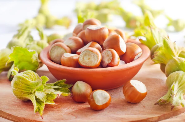 Nuts on wooden table — Stock Photo, Image