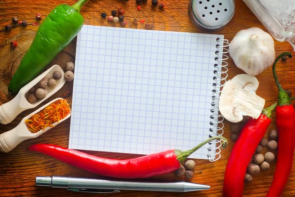 Vegetables and spices border and blank paper for recipes Stock Image