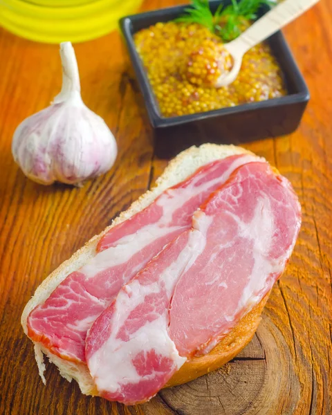 Bread with bacon — Stock Photo, Image