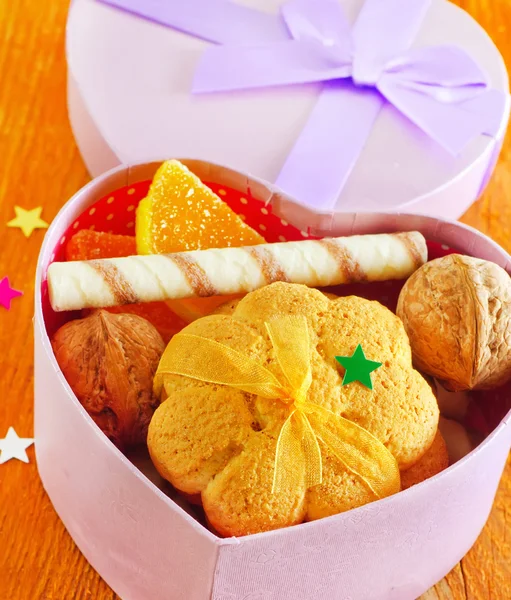 Galletas y dulces en el boz — Foto de Stock