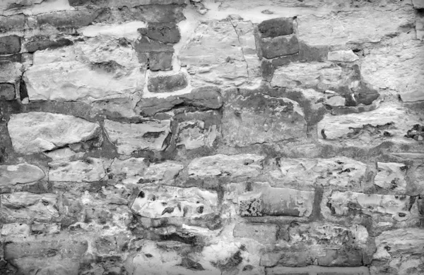 Antigua pared de ladrillo con fondo de capa de estuco agrietado —  Fotos de Stock