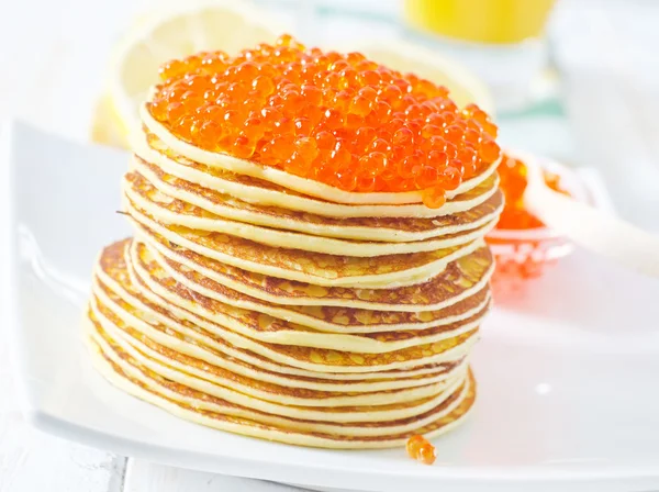 Pancakes with caviar — Stock Photo, Image