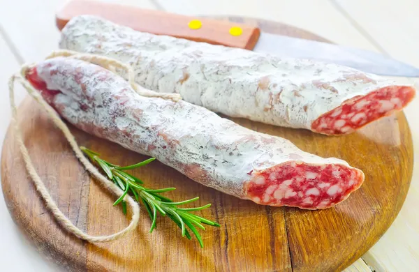 Salami on Wooden board — Stock Photo, Image