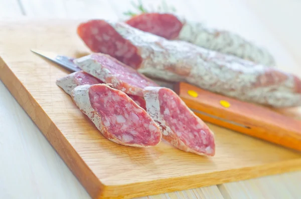Salami salami on a cutting board — Stock Photo, Image