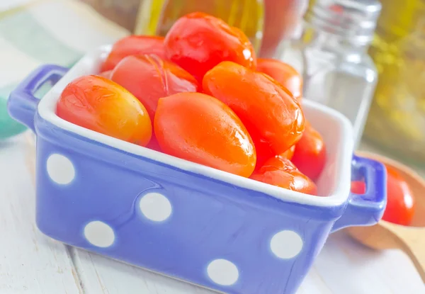 Tomato in cookware — Stock Image Tomato in cookware Stock Photo
