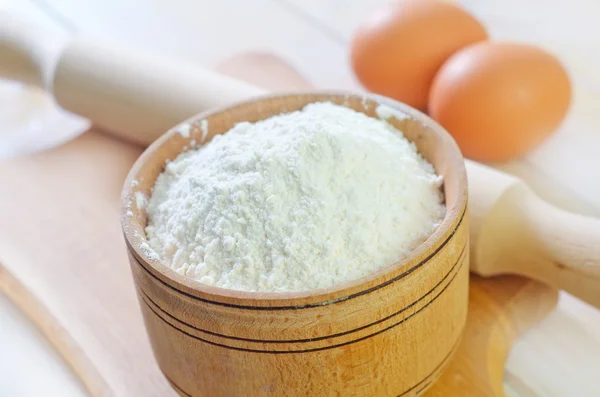 flour in a wooden bowl