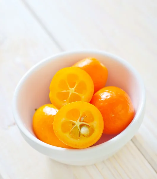 Kumquats in a bowl — Stock Photo, Image