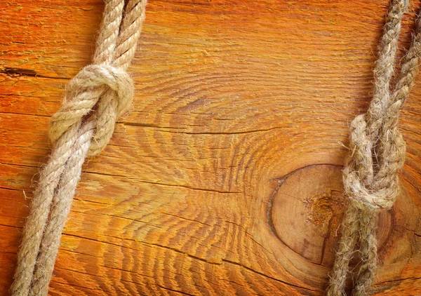 Rope on wooden background — Stock Photo, Image