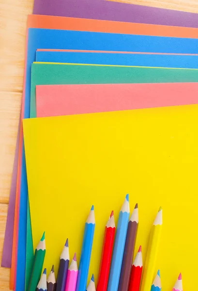 Color paper and pencils — Stock Photo, Image