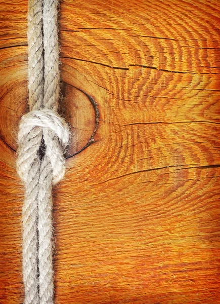 Rope on wooden background — Stock Photo, Image