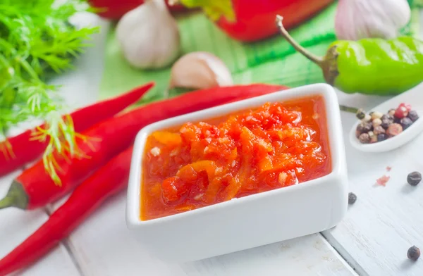 Fresh sauce from tomato and chilli peppers — Stock Photo, Image