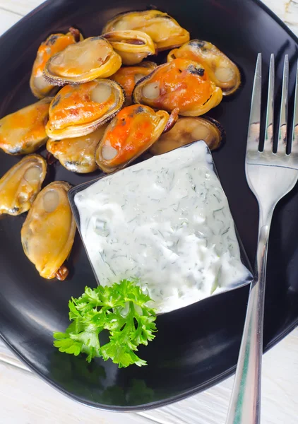 Mejillones con salsa — Foto de Stock