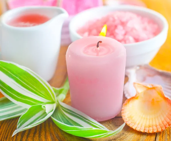 Candle and sea salt — Stock Photo, Image