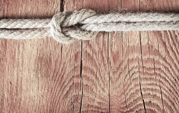 Rope on wooden background — Stock Photo, Image