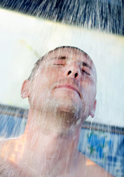 Young man in shower — Stock Photo, Image