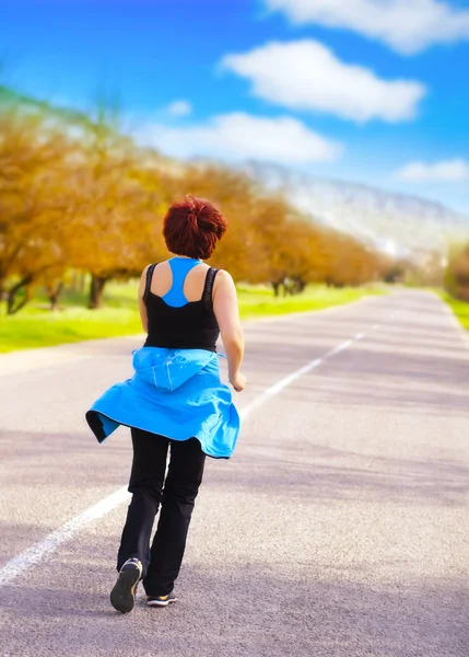 Woman jogging — Stock Photo, Image