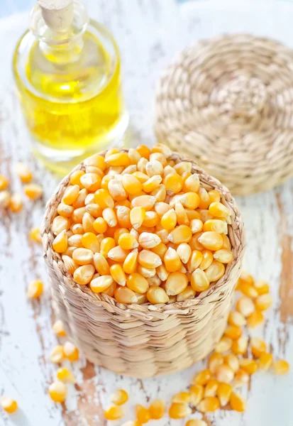 Corn and oil — Stock Photo, Image