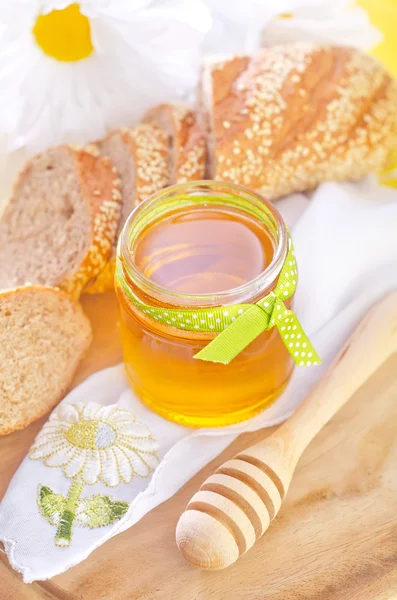 Honig und Brot — Stockfoto