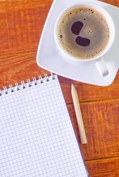 Note and coffee cup — Stock Photo, Image