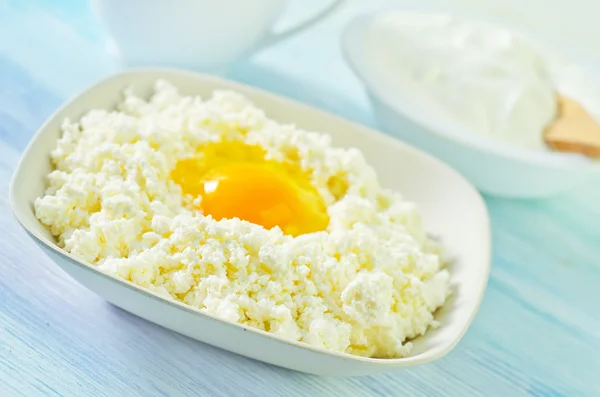 Cottage,eggs,milk and sour cream — Stock Photo, Image