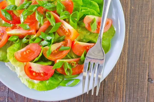 Salade dans une assiette — Photo