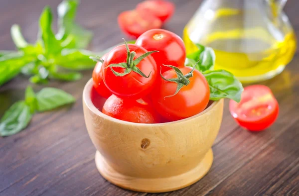 Tomato in a bowl — Stock Photo, Image