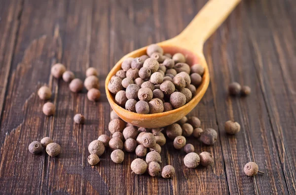 Pepper in spoon — Stock Photo, Image