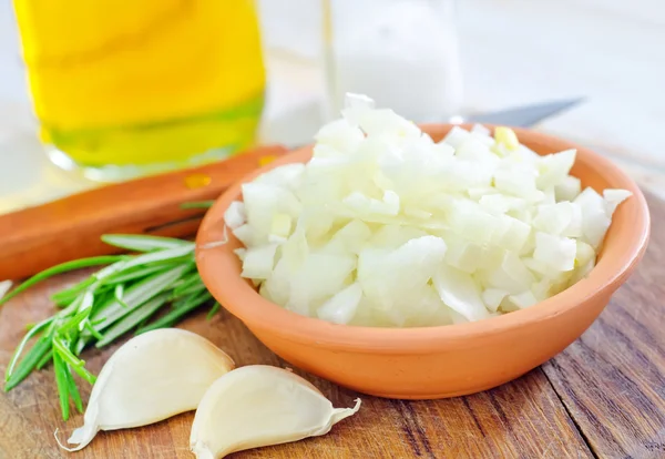 Onion in a bowl — Stock Photo, Image