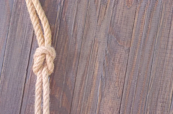 Rope on wooden background — Stock Photo, Image