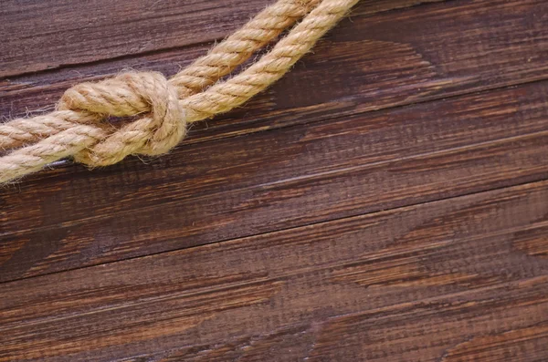 Seil auf Holzgrund — Stockfoto