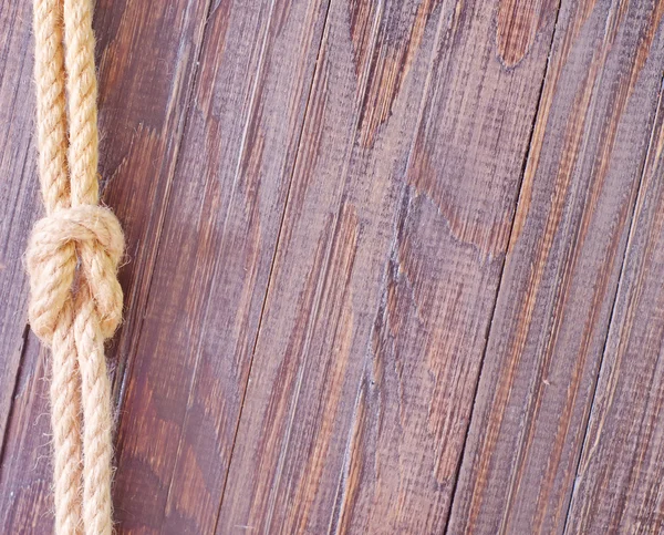 Rope on wooden background — Stock Photo, Image