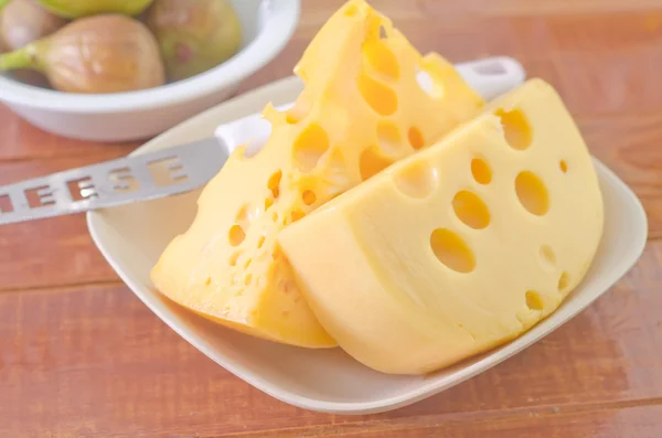 Cheese in a plate — Stock Photo, Image