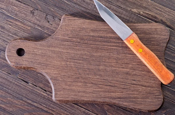 Knife on board — Stock Photo, Image