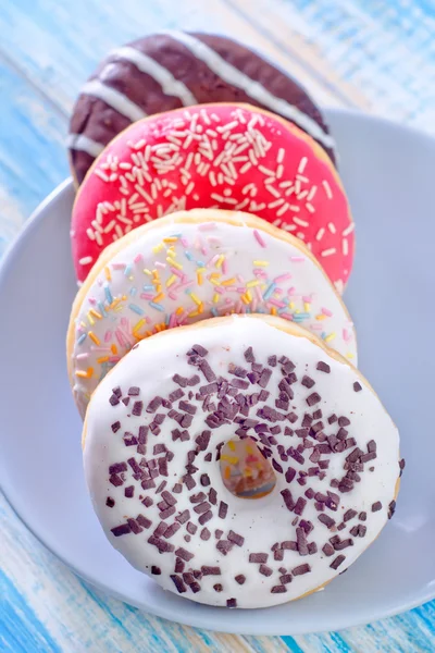 Donuts in een plaat — Stockfoto